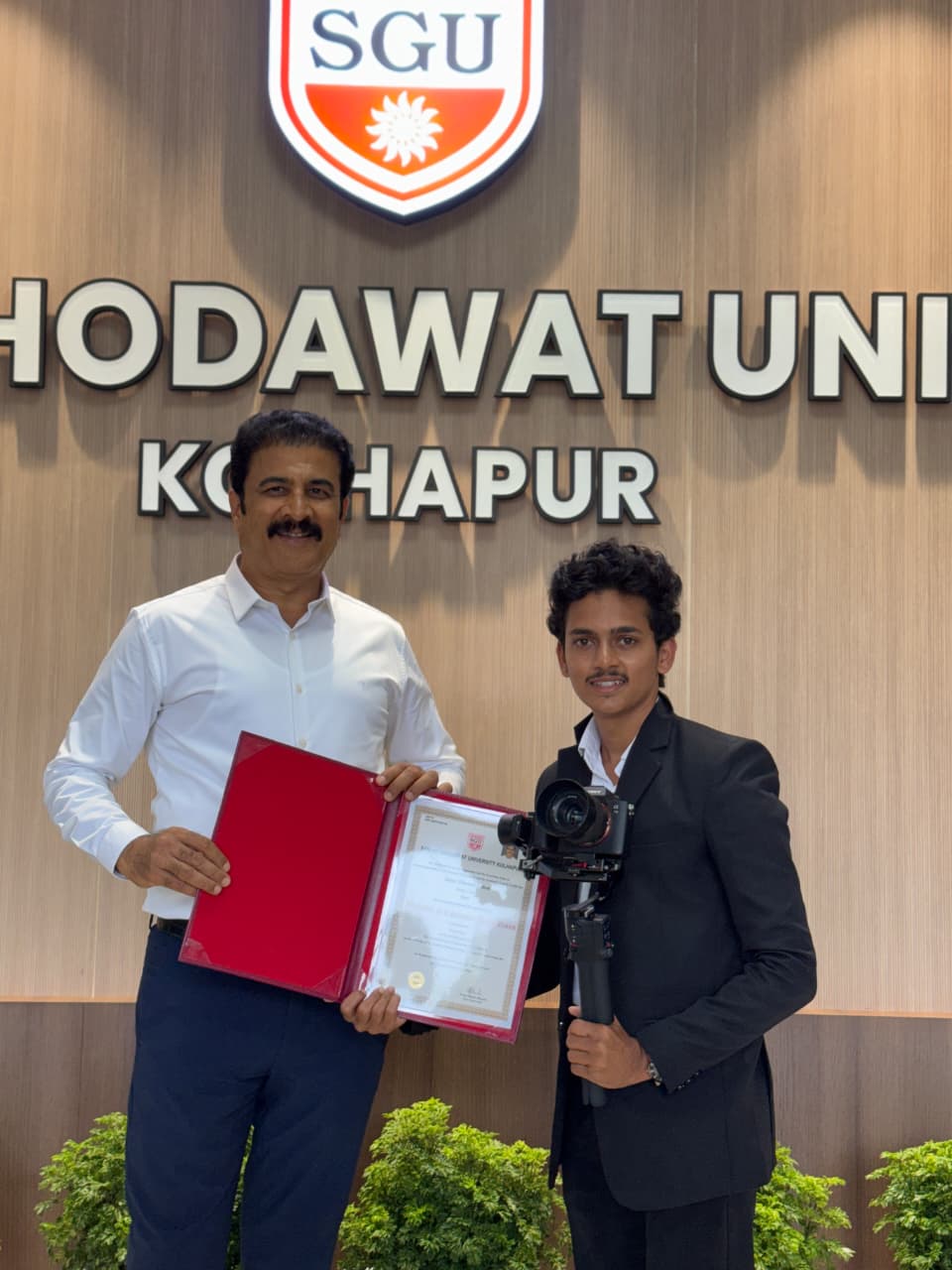 Dhawal Sutar receiving a certificate at Sanjay Ghodawat University, Kolhapur