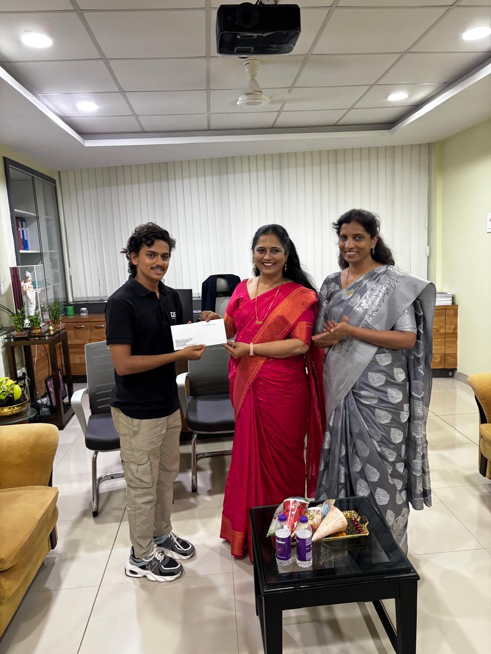 Dhawal Sutar being felicitated by clients
