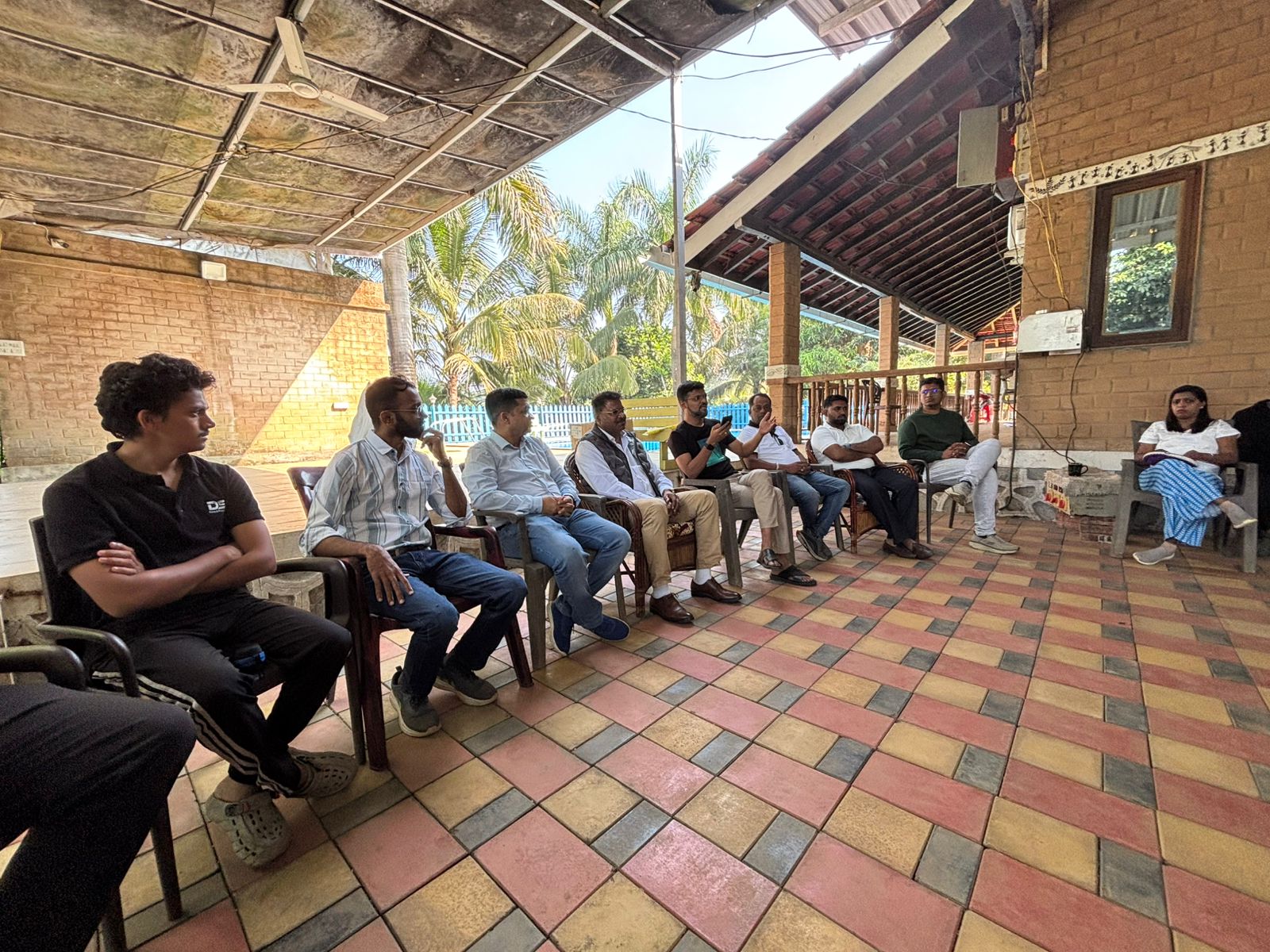 Guests seated at an outdoor community event